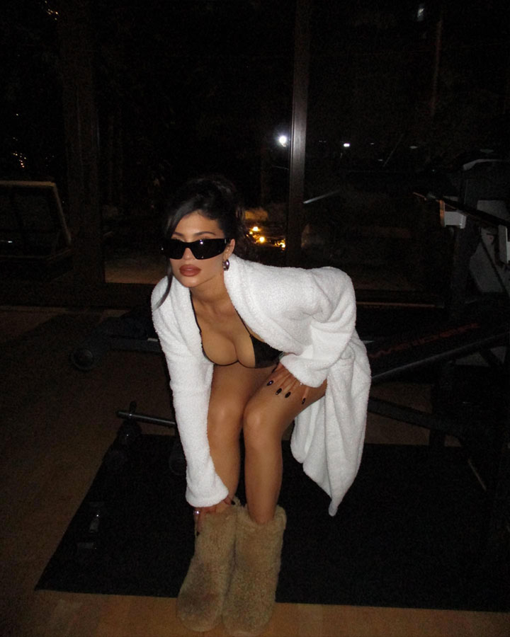 Kylie Jenner Instagram Good American bikini fuzzy boots leaning over