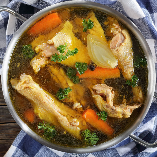 pot of chicken bone broth cooking