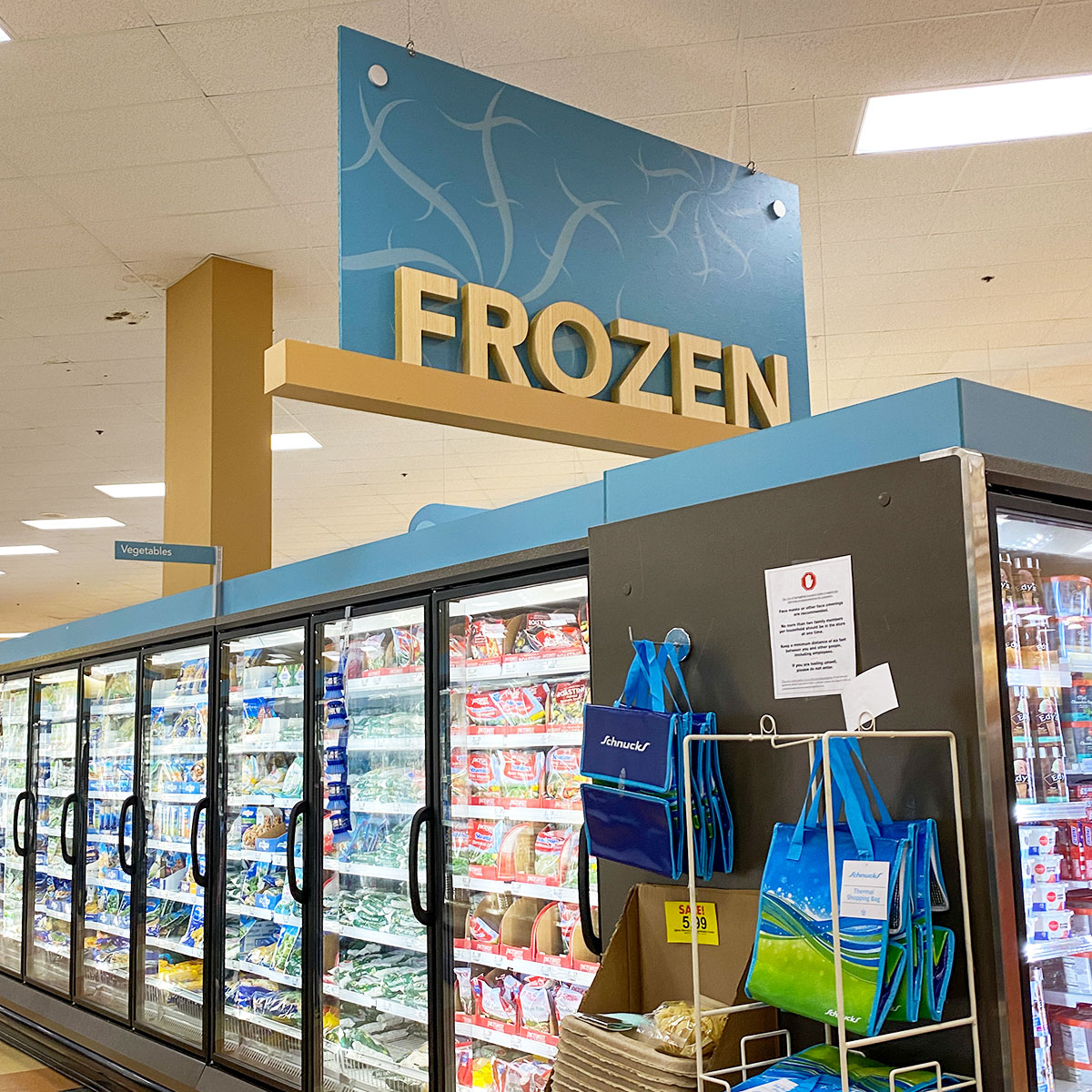 frozen food aisle at grocery store