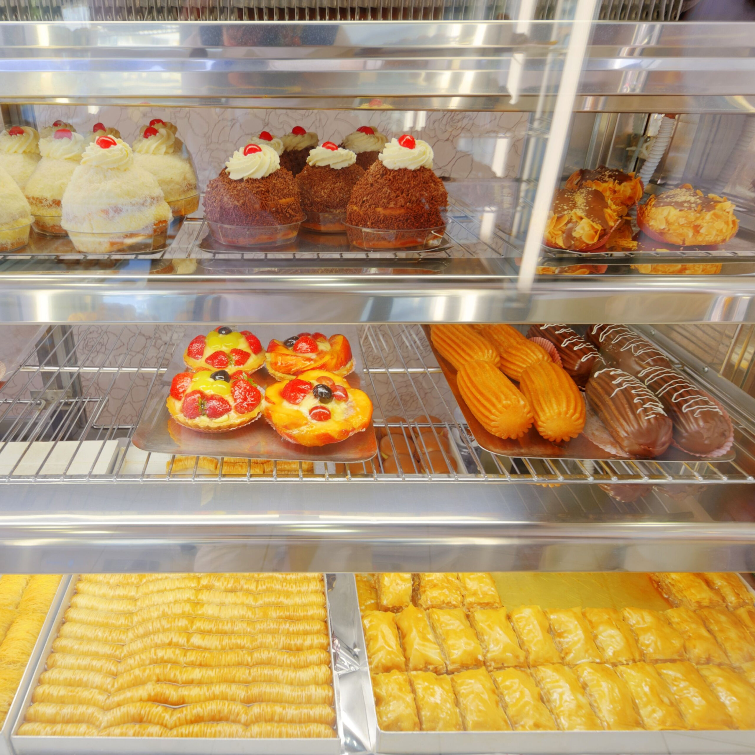 various pastries on display in pastry case