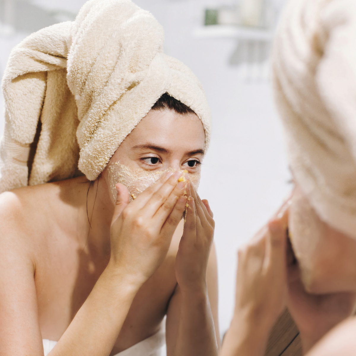 Woman exfoliating.