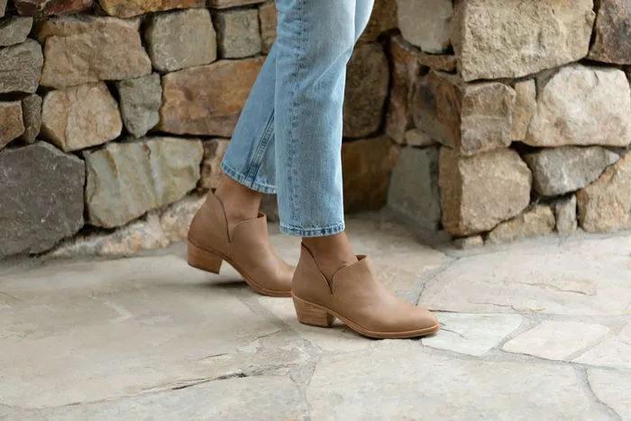 Trendy model wearing FW22 colorway shoes in campaign.