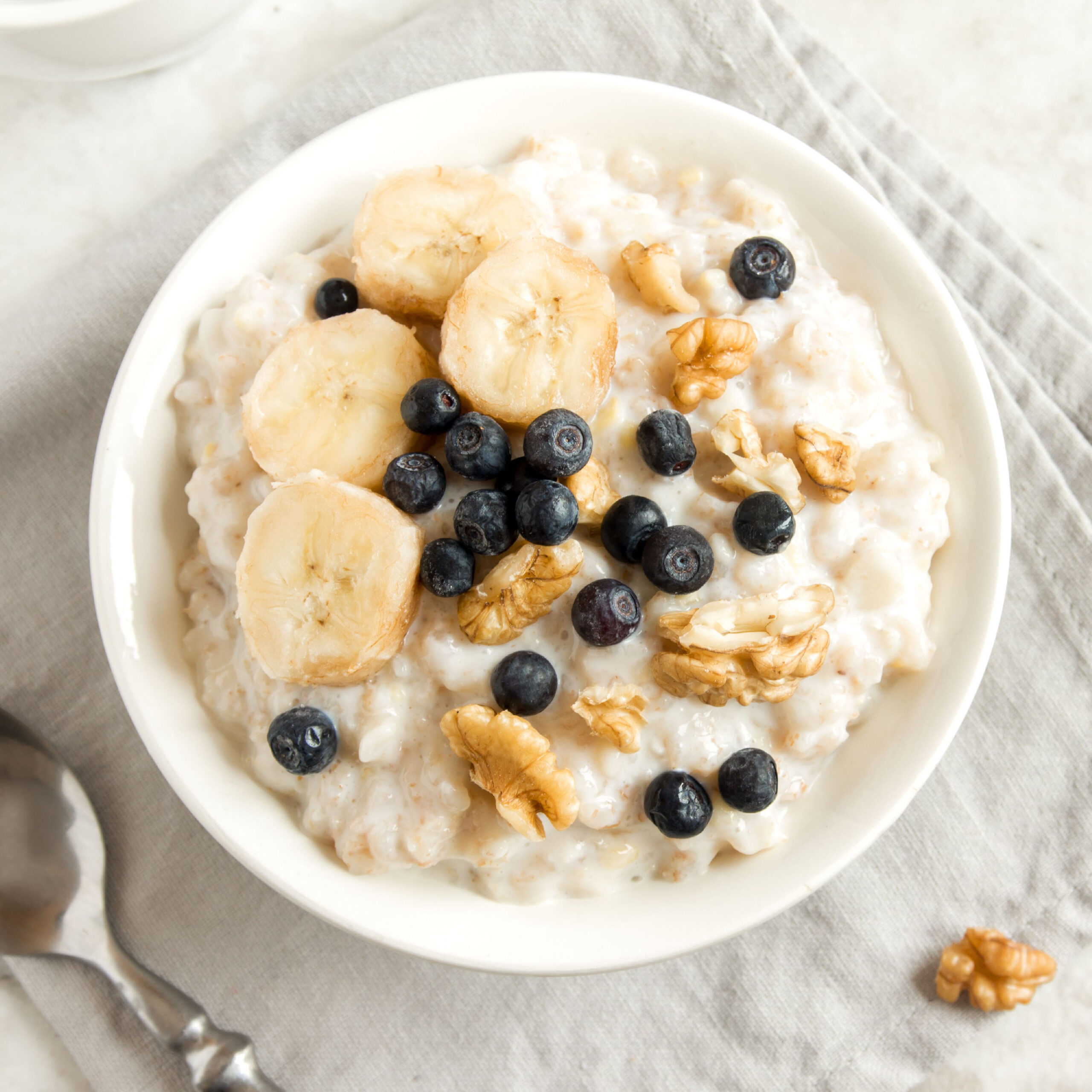 oatmeal topped with blueberries, banana, and walnuts