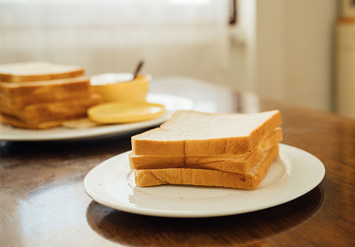 Stack of white bread.