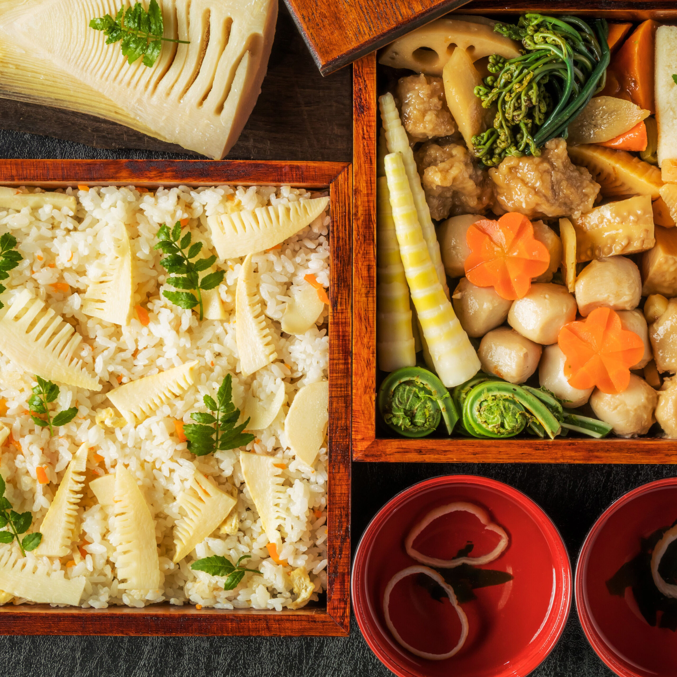 japanese lunch boxes with bamboo shoot rice