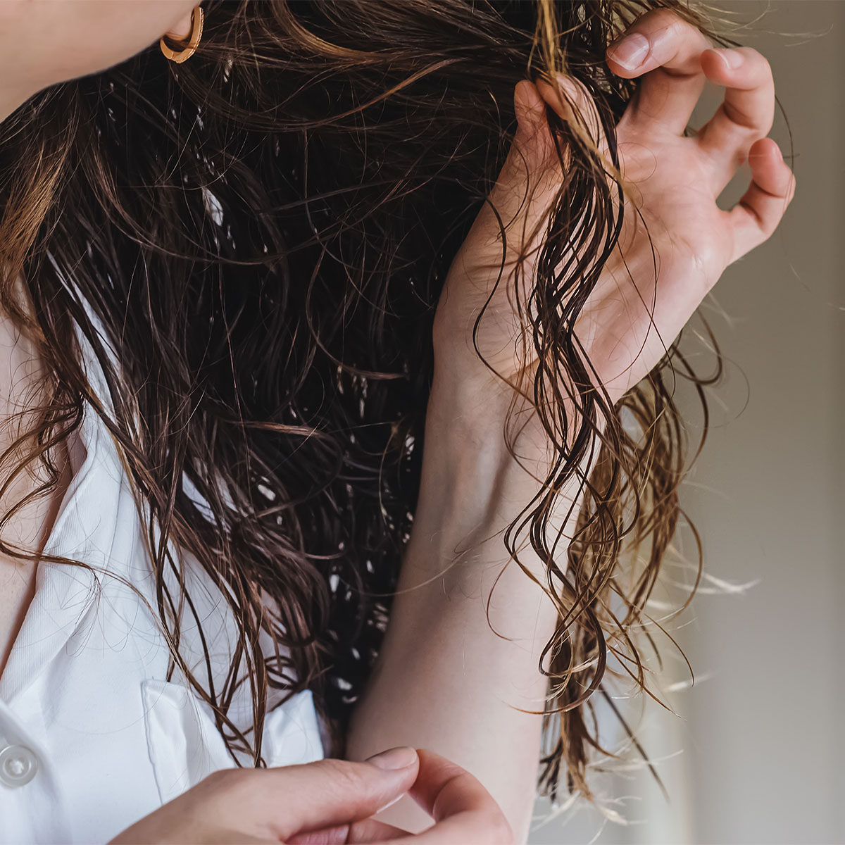 The Worst Haircut For Curly, Thinning Hair, According To Experts