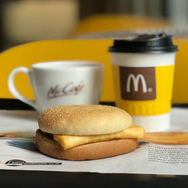 mcdonalds egg sandwich and coffee