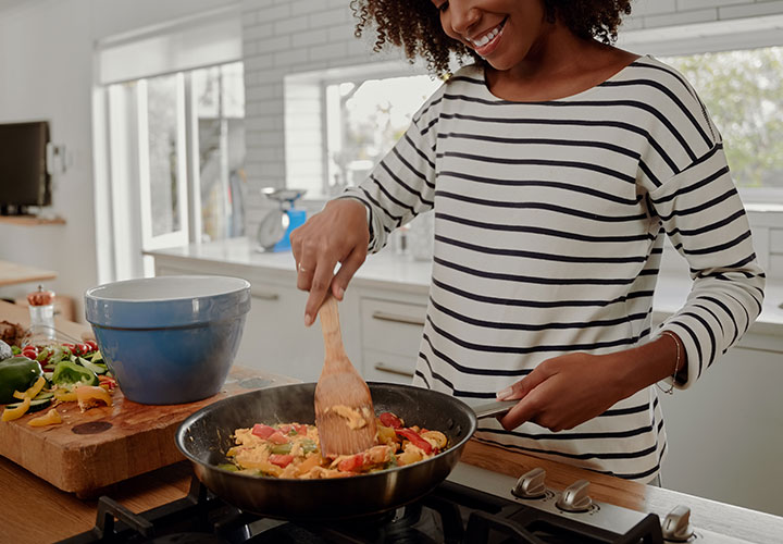 Woman cooking.