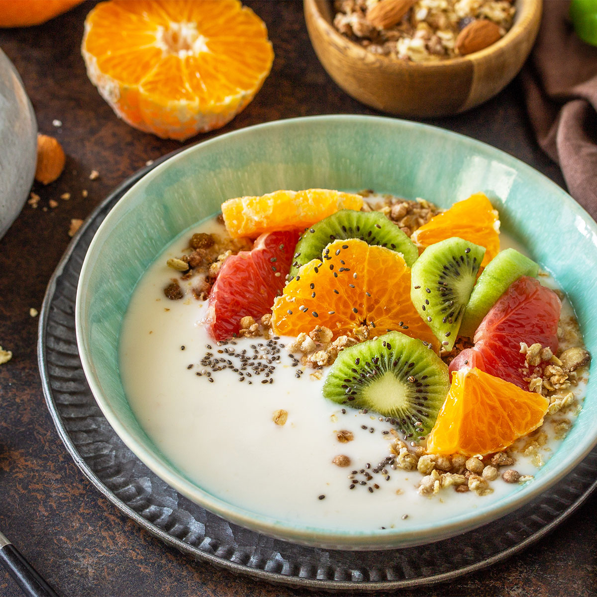 yogurt topped with fruit and chia seeds