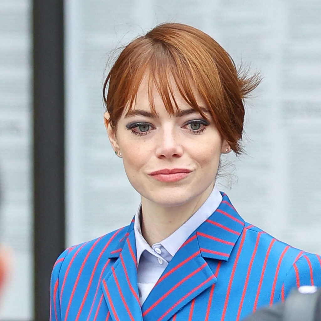 Emma Stone Wore Cropped Jacket and Mini Skirt at Louis Vuitton Show