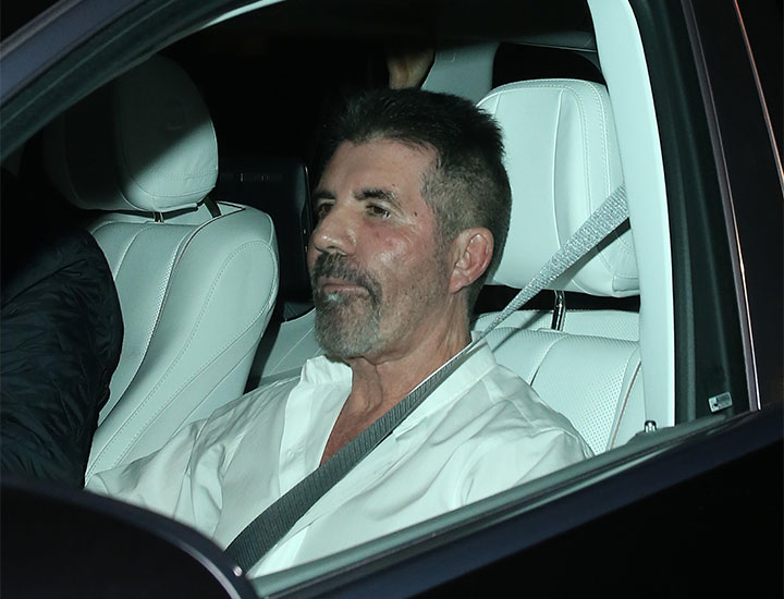 Simon Cowell paparazzi picture in the car 2023