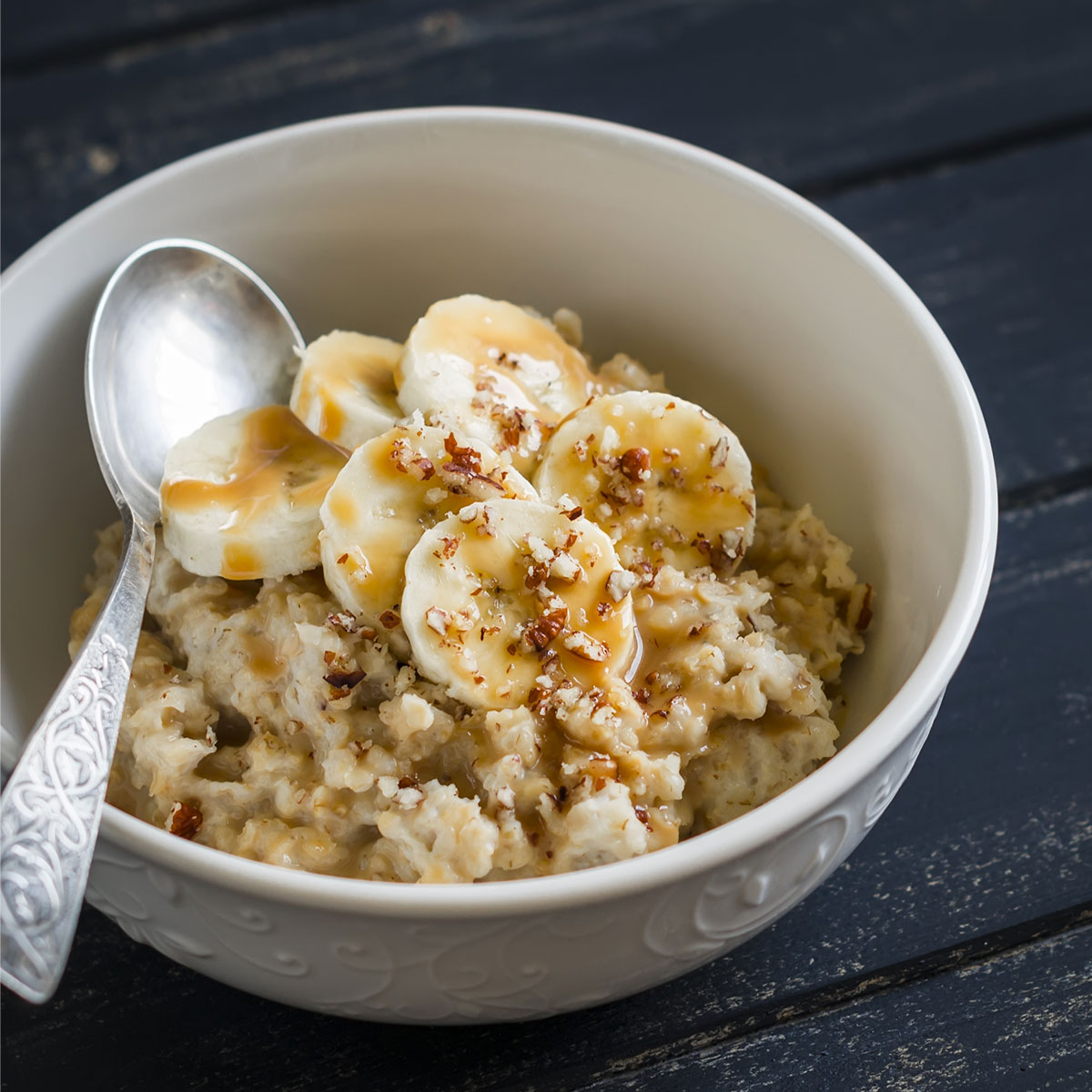bowl of oatmeal topped with banana