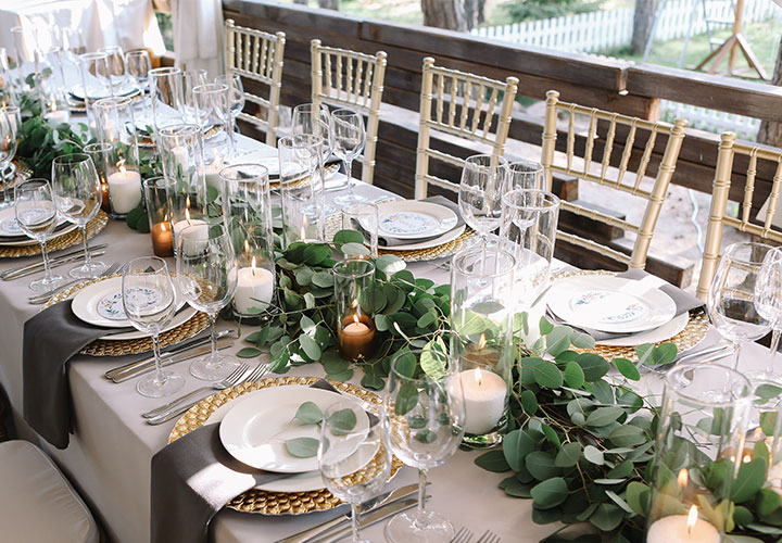 Table with greenery in the middle