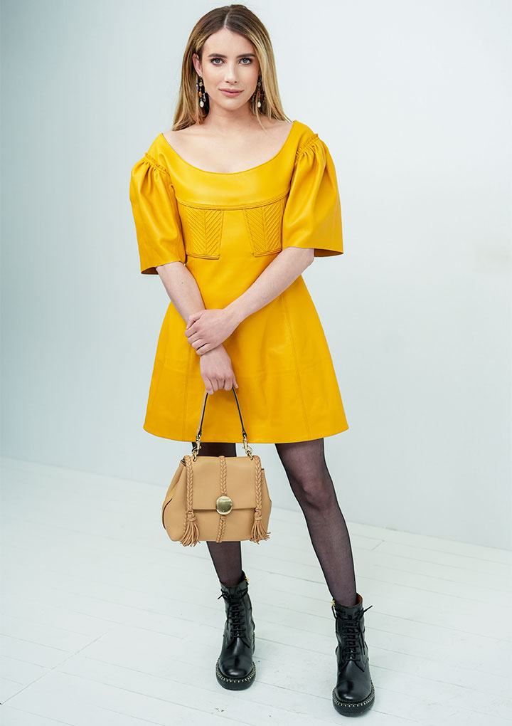 Emma Roberts at Chloé 2023 fashion show in a yellow dress