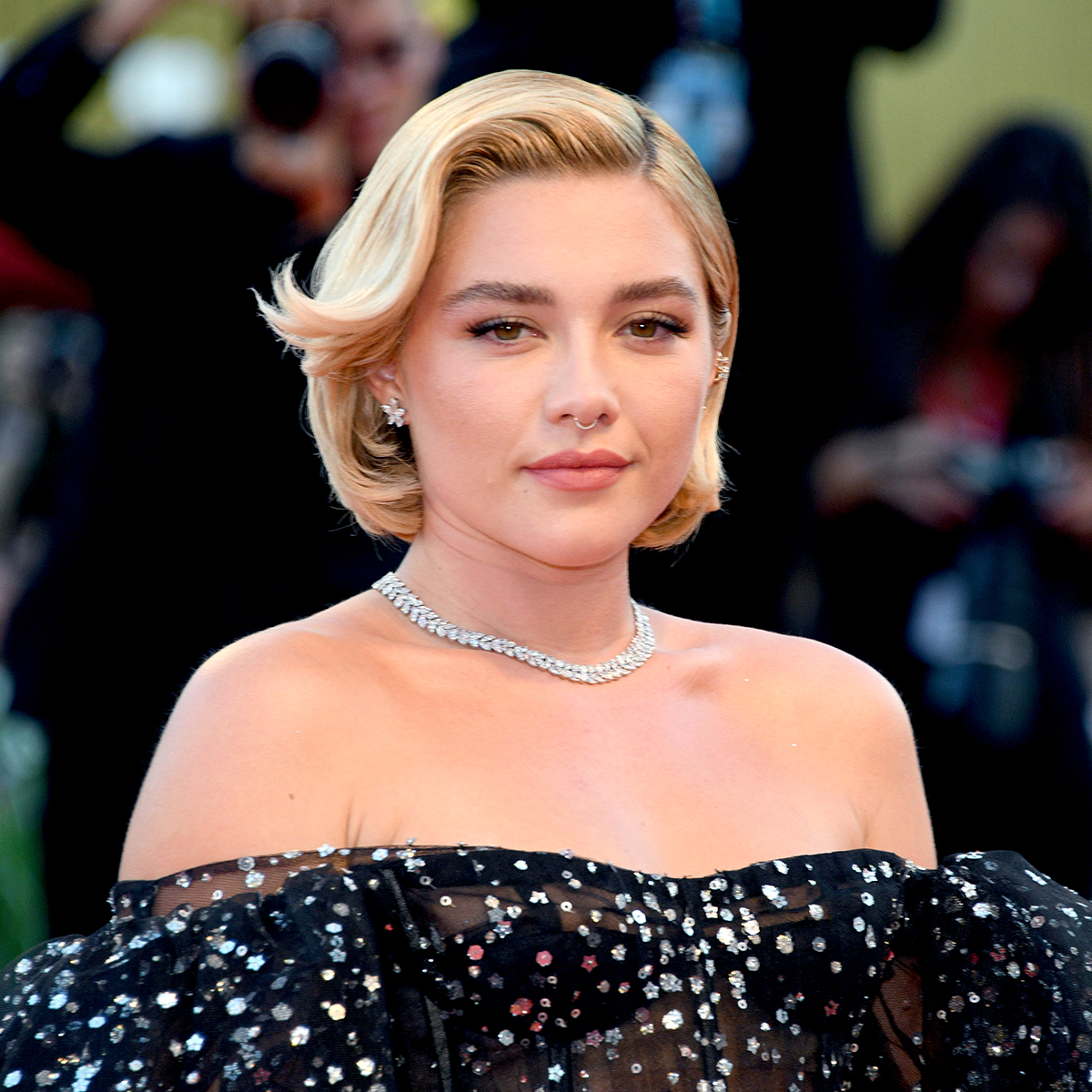 Florence Pugh Is A Vision In Curve-Hugging Checkered Pants While