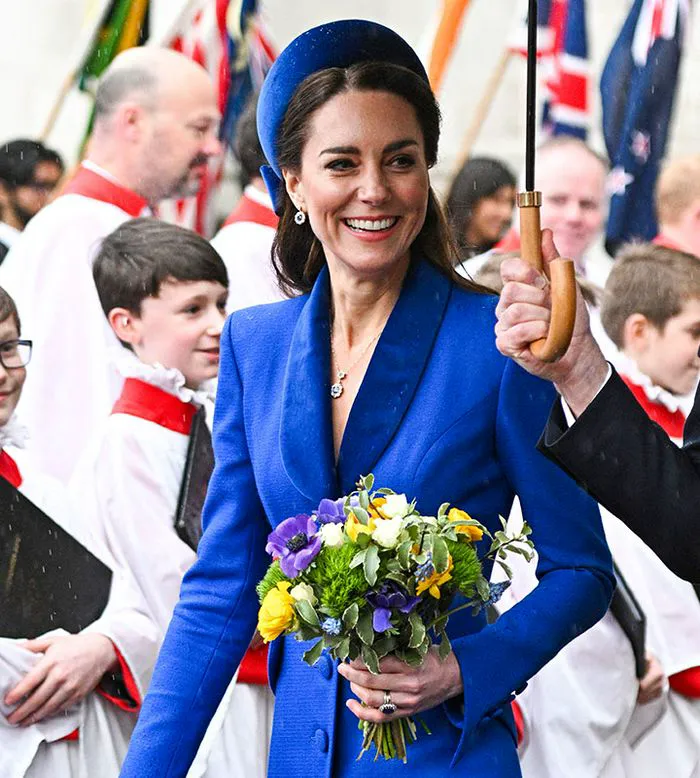 Kate Middleton in a blue outfit with hat at the 2022 Commonwealth service
