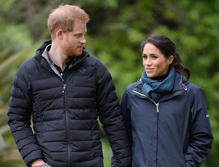 Prince Harry Meghan Markle walking outside