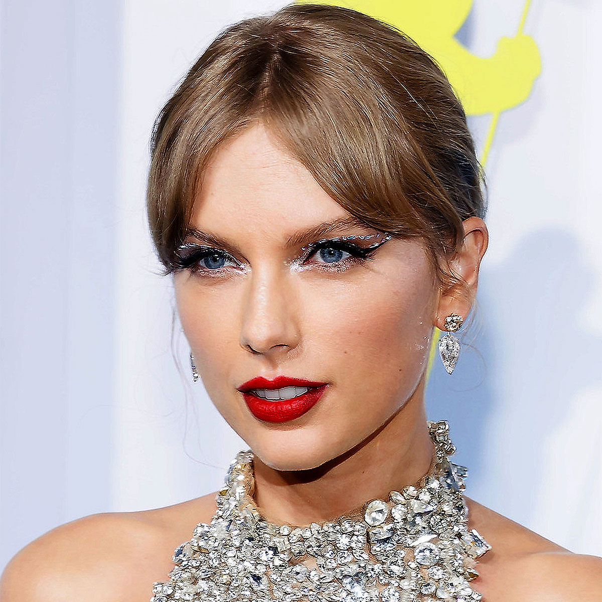 taylor swift red lipstick blonde hair updo red carpet crystal silver dress