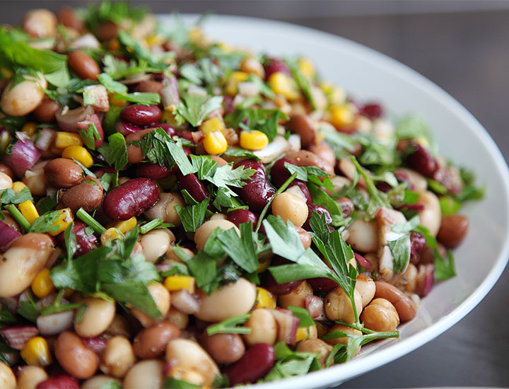 A salad with beans on a plate