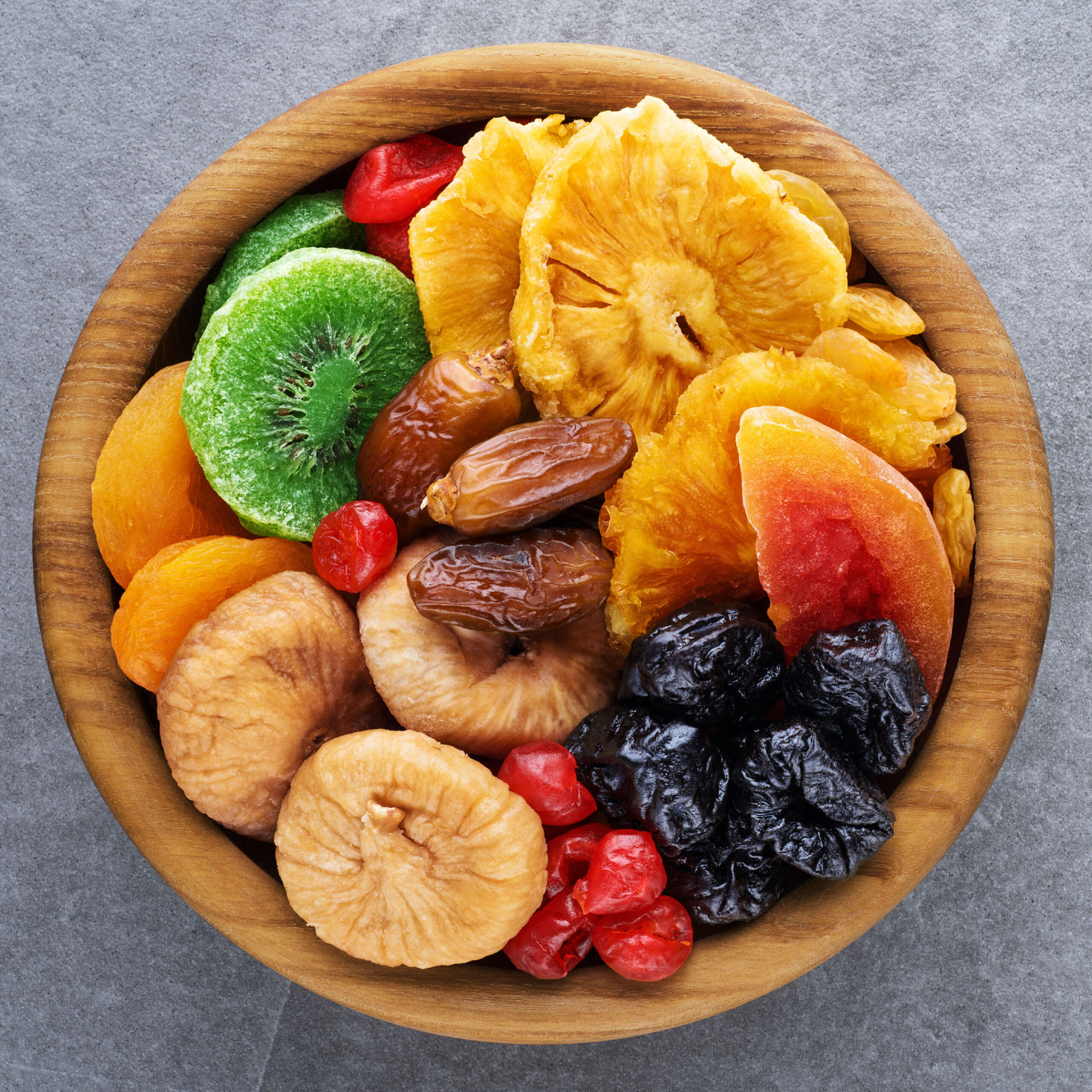 dried fruits in wooden bowl