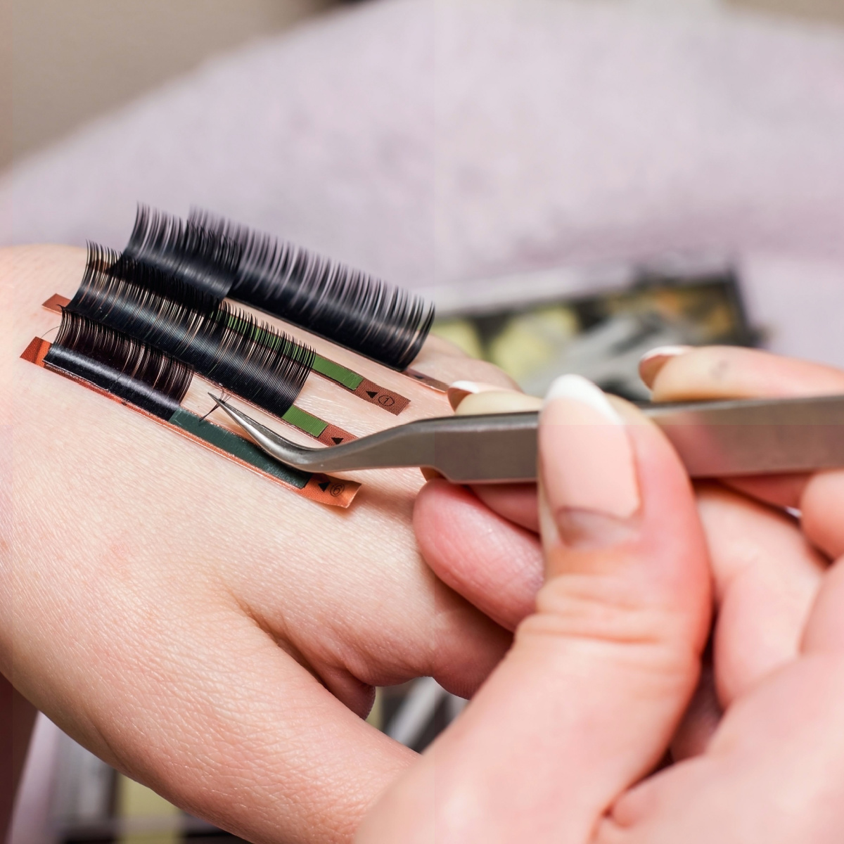 eyelash extenstions expert hand beauty salon fake eyelashes growth glue-on beauty cosmetic product