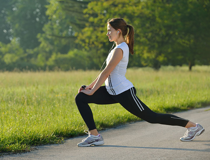 Woman stretching for a run