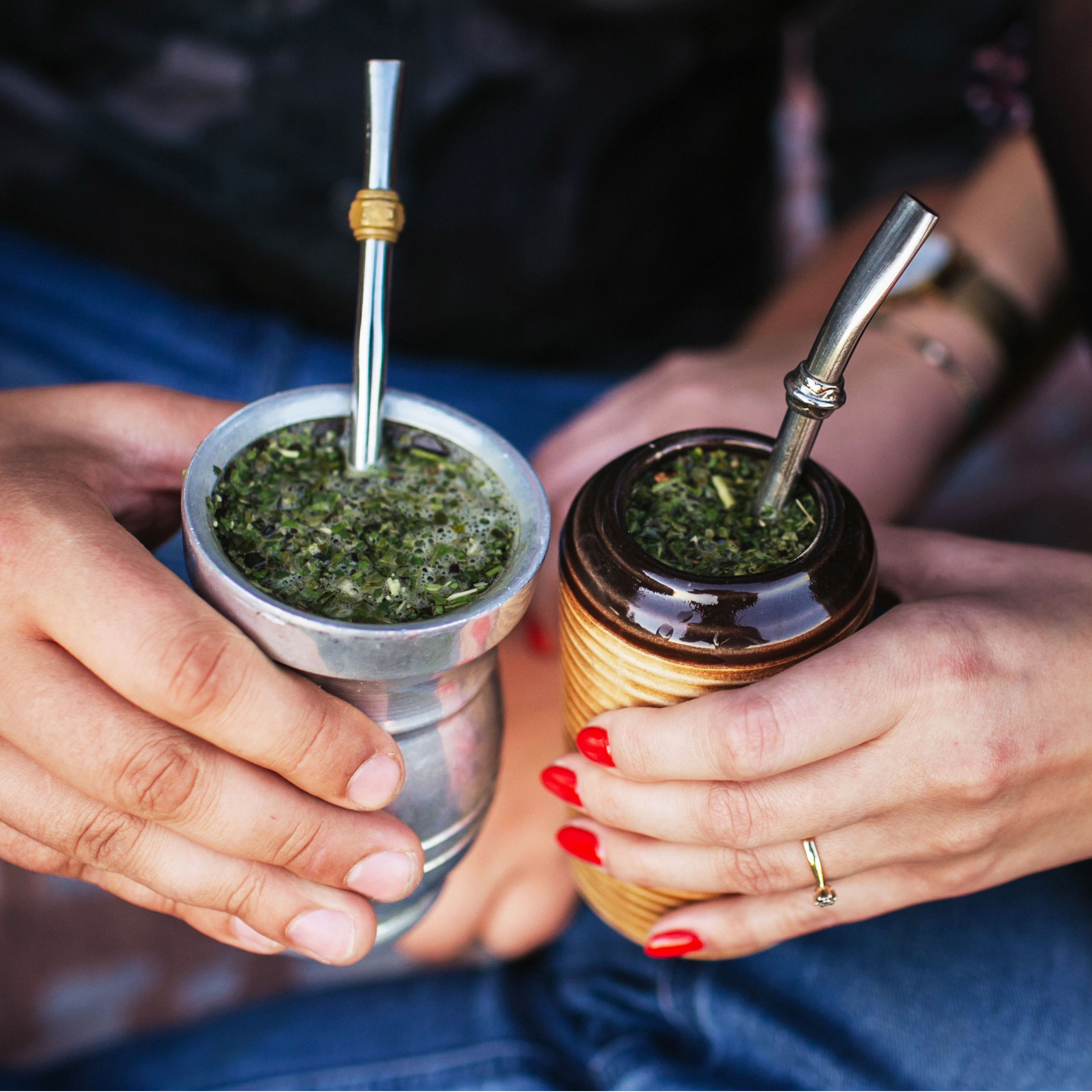 people holding yerba mate