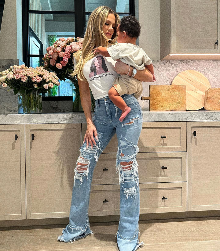 Khloe Kardashian holding son Tatum controversial Kim Kardashian T-shirt Instagram