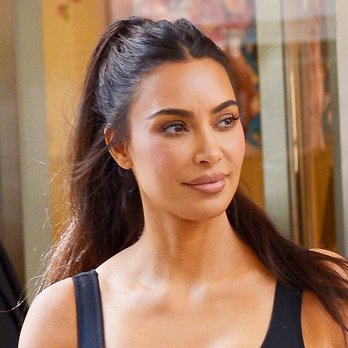Kim Kardashian Flaunts Her Iconic Curves In An Unzipped Swimsuit