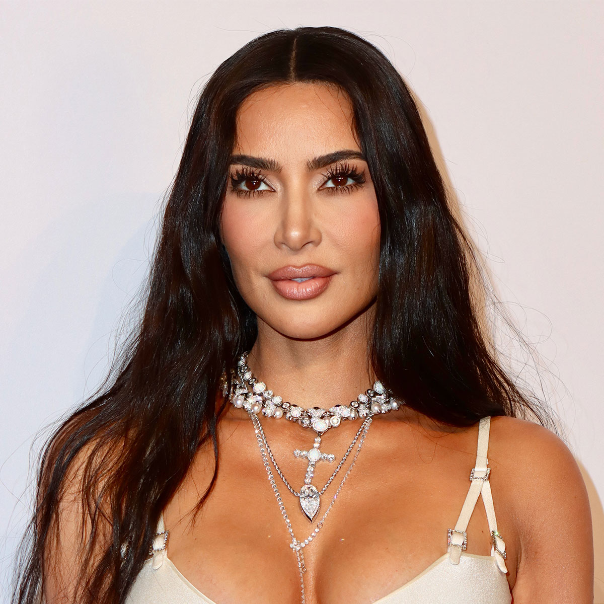 Kim Kardashian Steals The Show In A 90s-Inspired Ivory Silk Bra