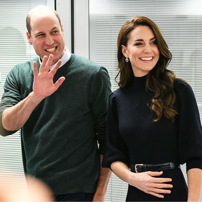 prince william kate middleton waving blue shirt navy dress smiling