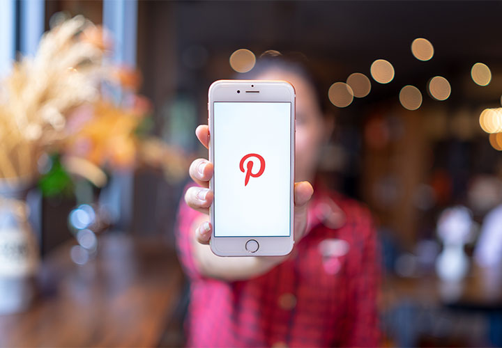 Cell phone with Pinterest logo