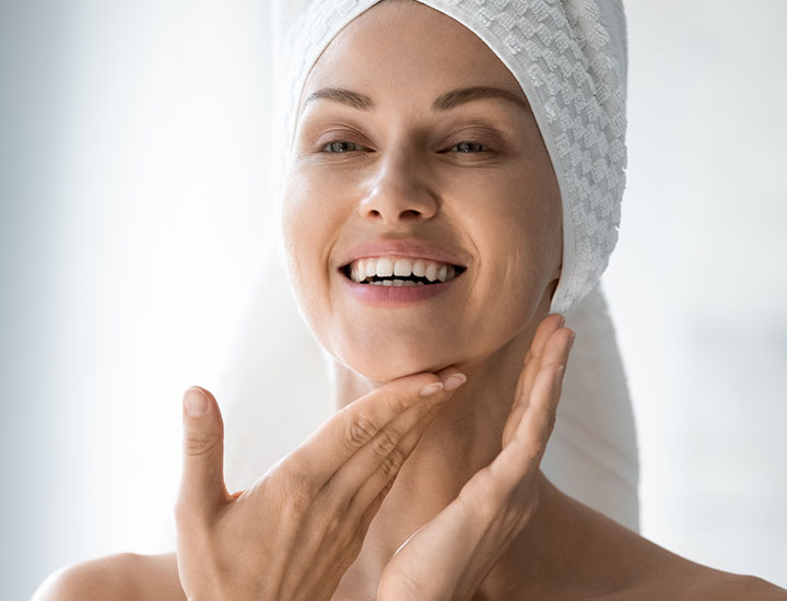 smiling-woman-hair-in-towel