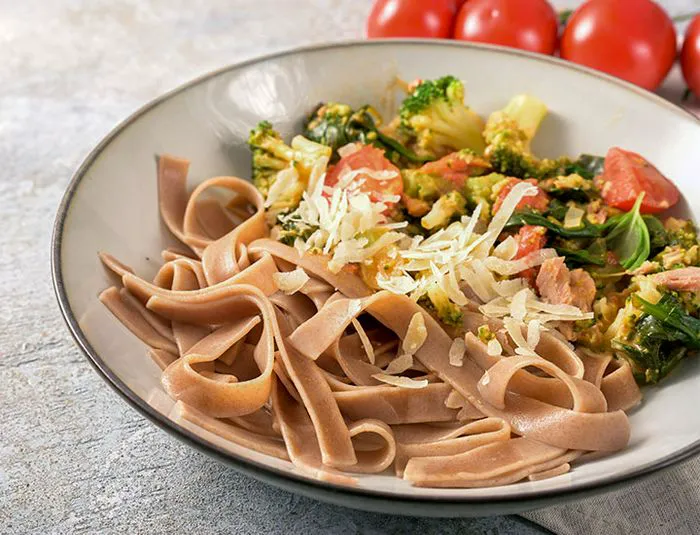 Whole grain pasta with a side of vegetables