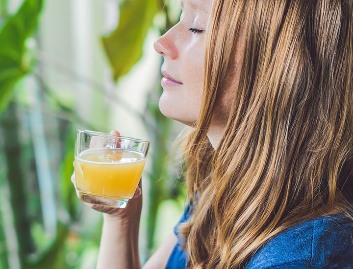 Woman enjoying a mug of tea