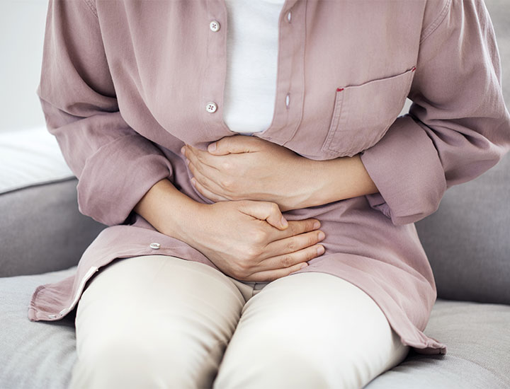 Woman with abdominal pain inflammation