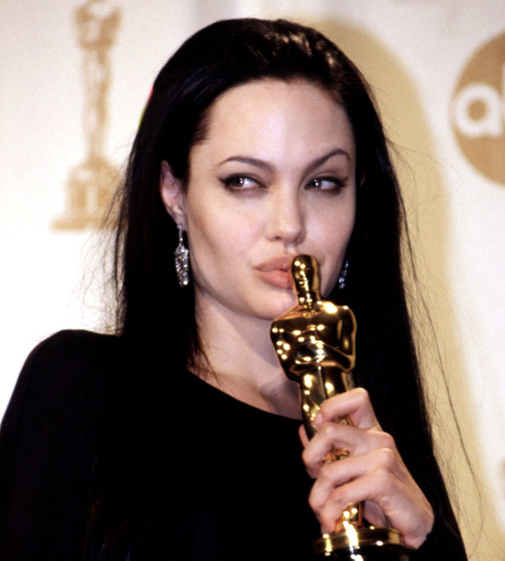Angelina Jolie kissing Academy Award for Girl Interrupted