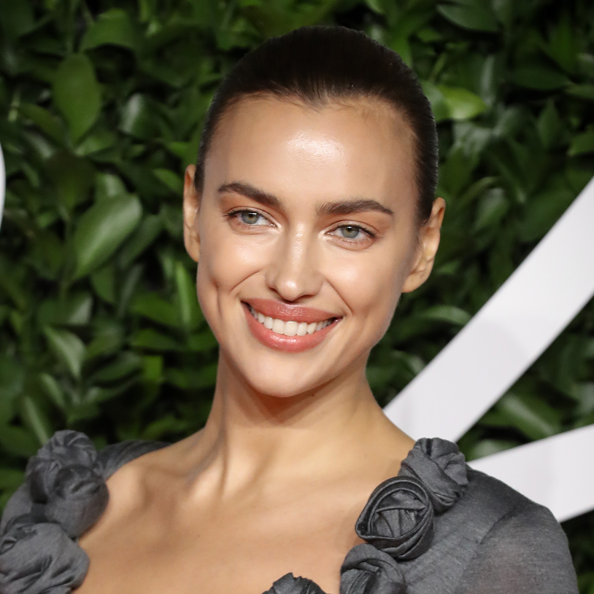 Irina Shayk Is ‘Magic’ In A White Rhinestone Maxi Dress—It’s So Sheer