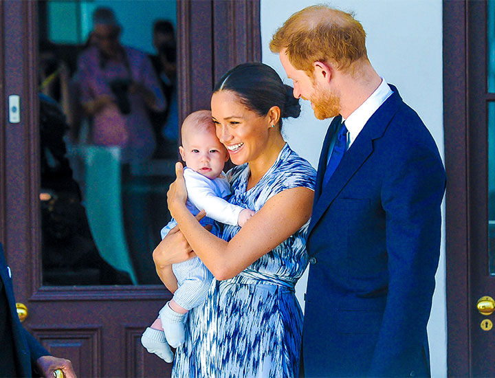 Prince Harry and Meghan Markle with Archie as a baby