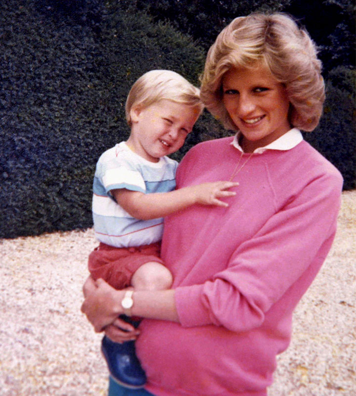 Princess Diana holding Prince Harry