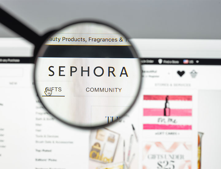 Sephora website with magnifying glass over logo