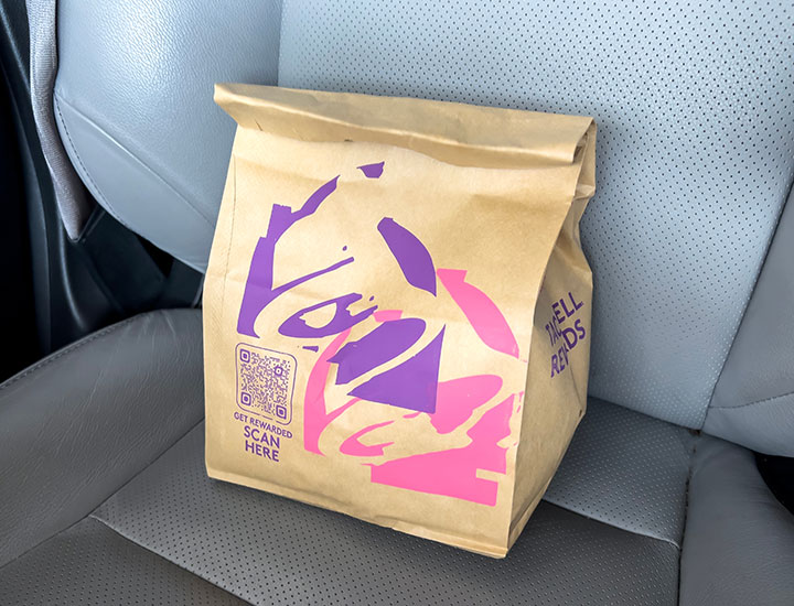https://www.shefinds.com/files/2023/06/Taco-Bell-takeout-bag.jpg