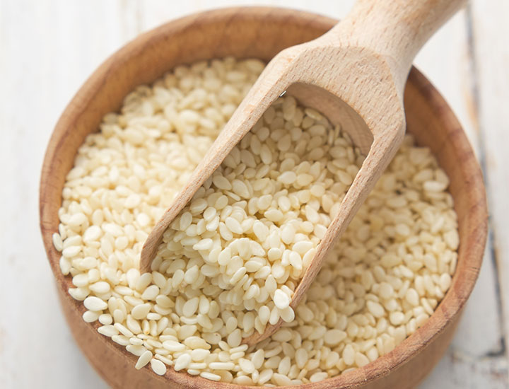 Bowl of white sesame seeds