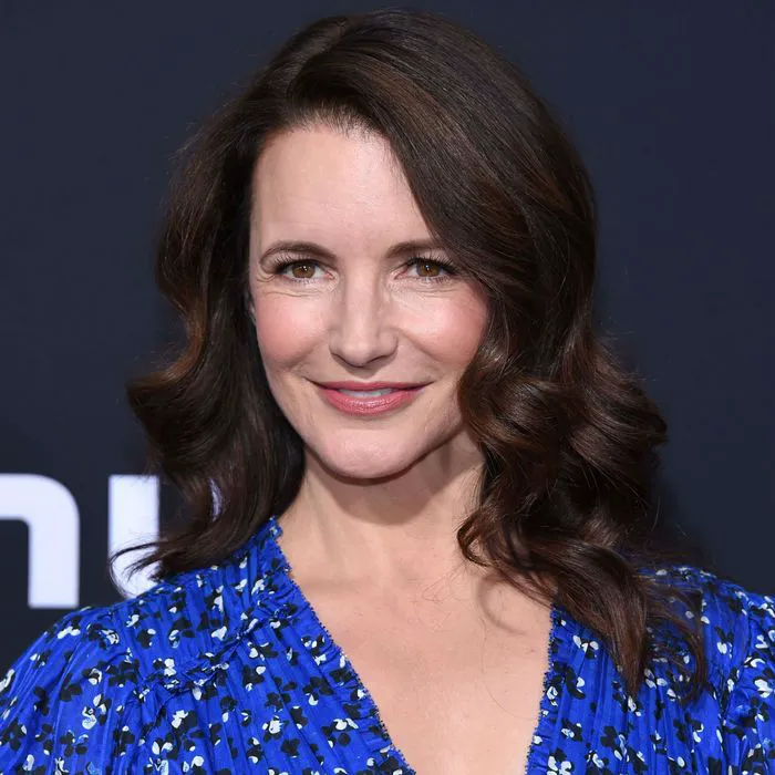 Kristin Davis on the red carpet, glamorous headshot.