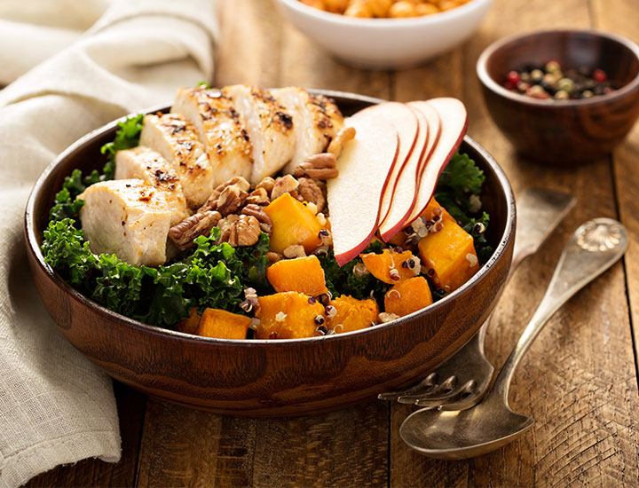 Salad bowl with chicken apples quinoa