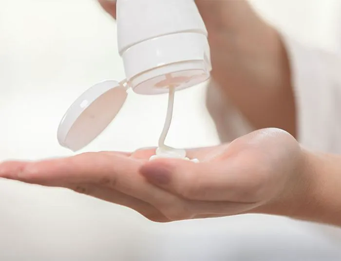 squeezing-shampoo-bottle