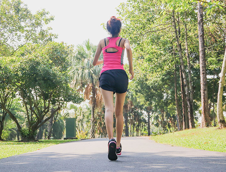 Woman running on a path