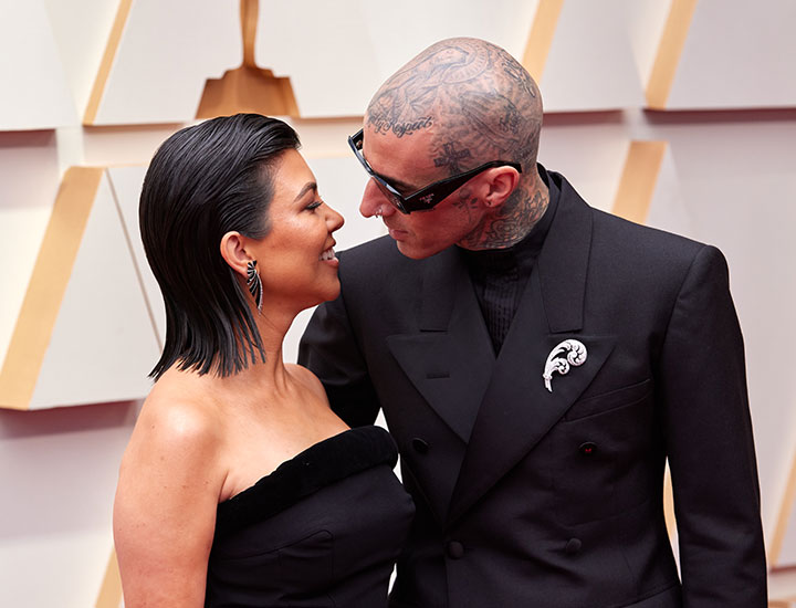 Kourtney Kardashian and Travis Barker at the 2022 Oscars