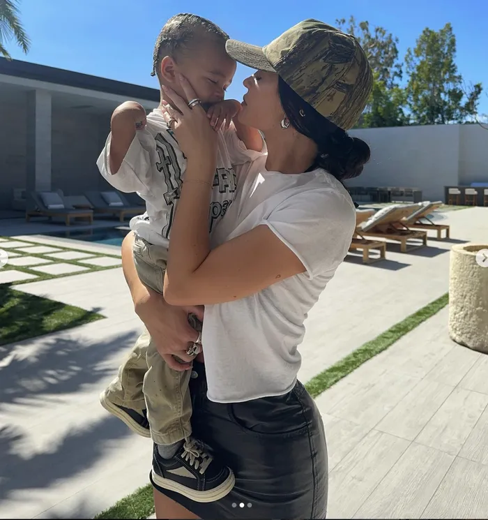 Kylie Jenner holding her son Aire