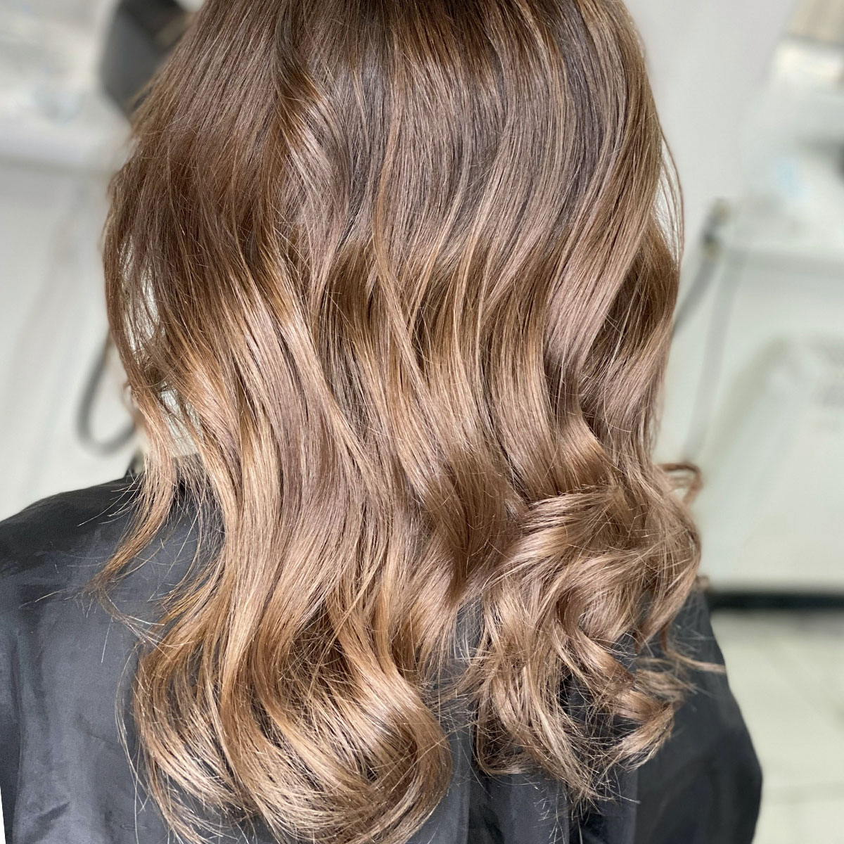 healthy brown brunette blonde highlights hair long curly ends salon